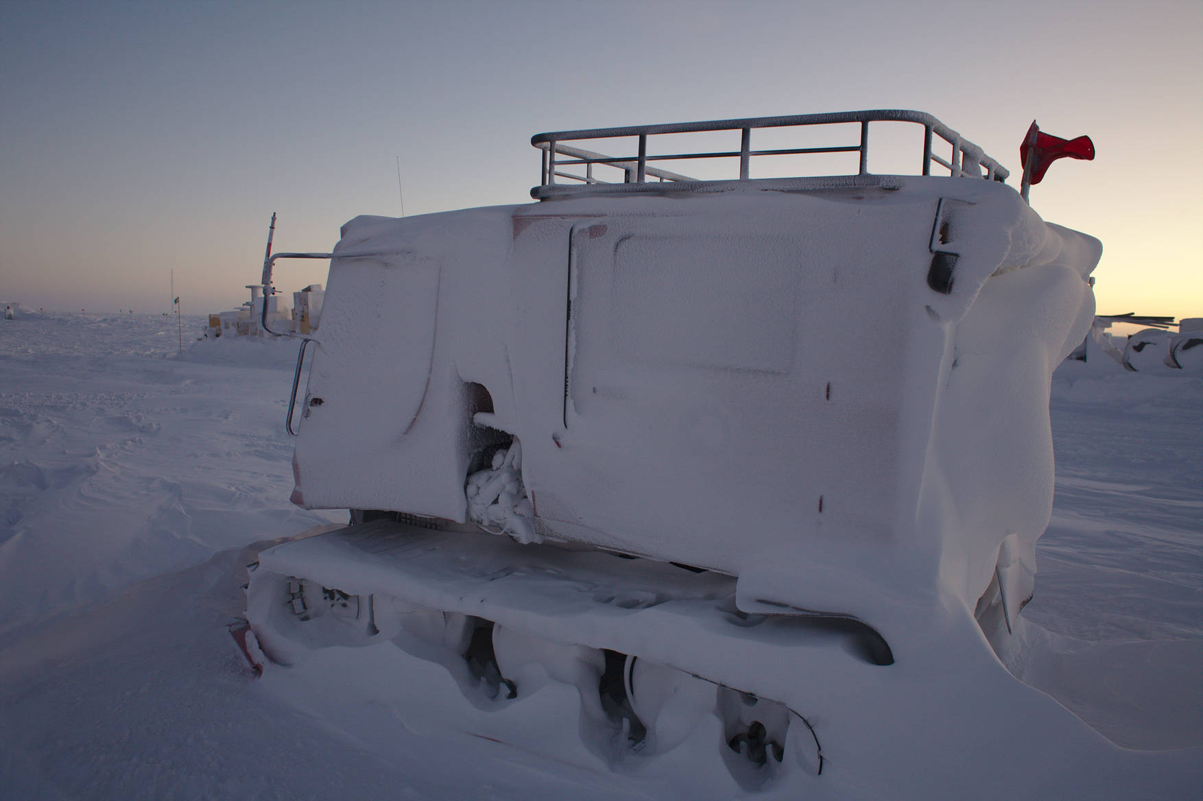 Snow-covered Pistenbully.